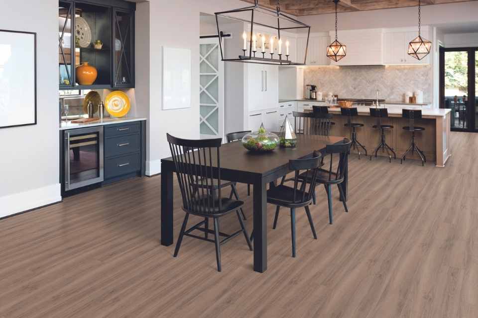 wood-look luxury vinyl plank in open concept modern farmhouse dining room kitchen
